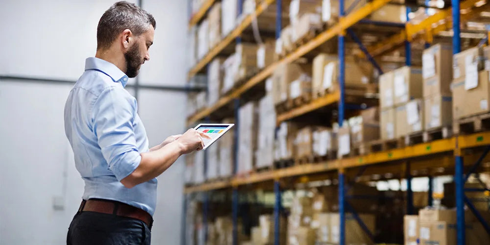 Worker doing a safety check on an iPad