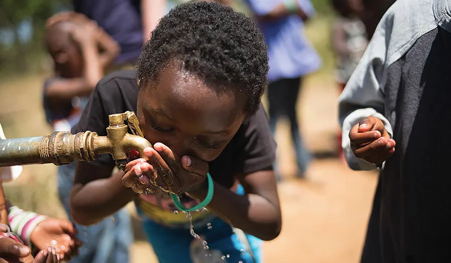 Kids drinking fresh water