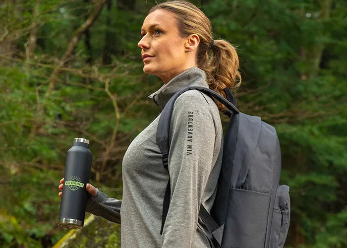Girl with Promo Water Bottle and Backpack outdoor